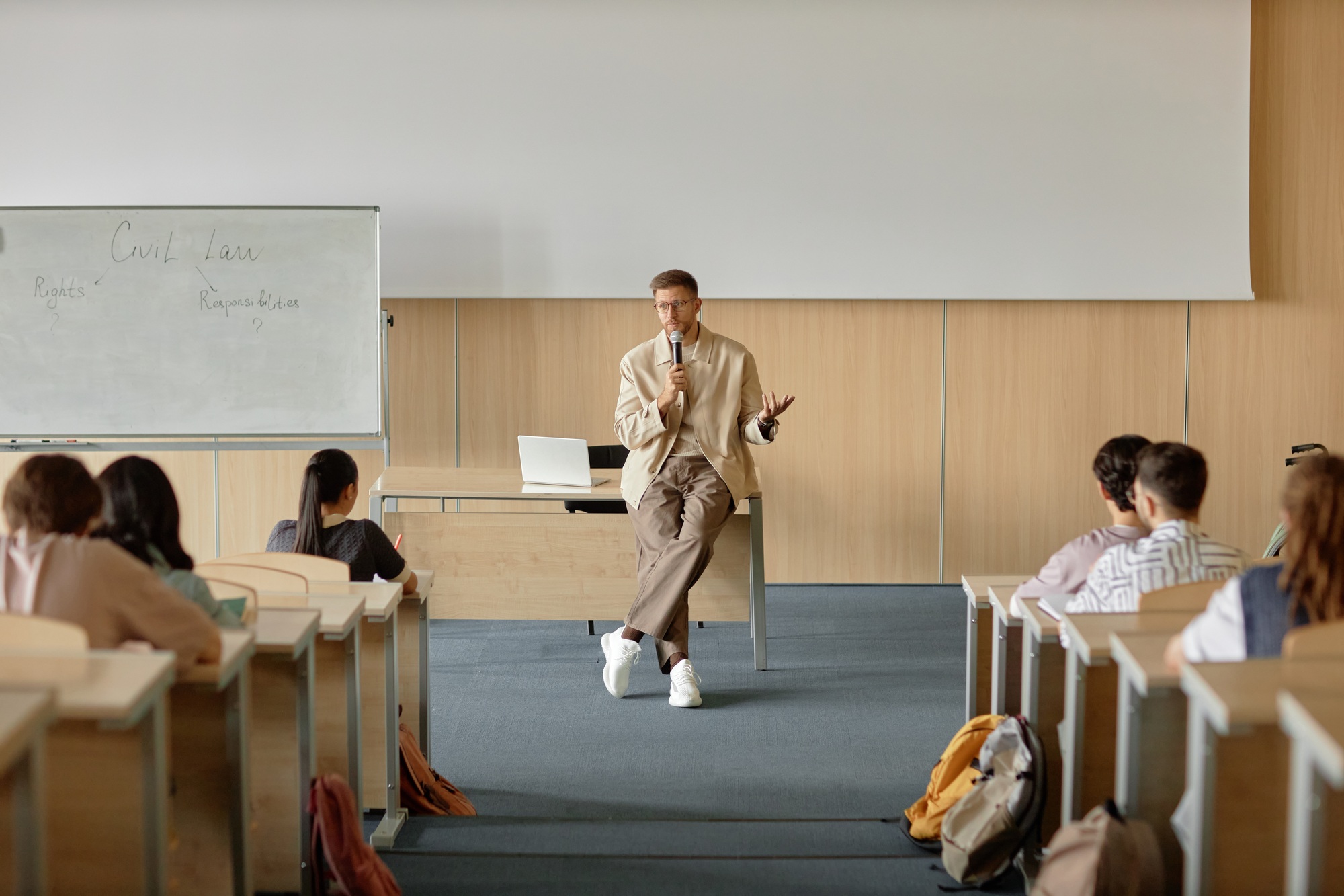 University Professor Giving Lecture on Law in Classroom